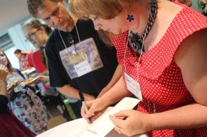 Me signing Shatterwing (photo by Cat Sparks)