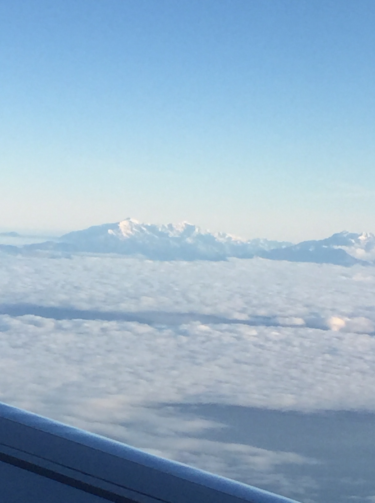 snow mountains plane