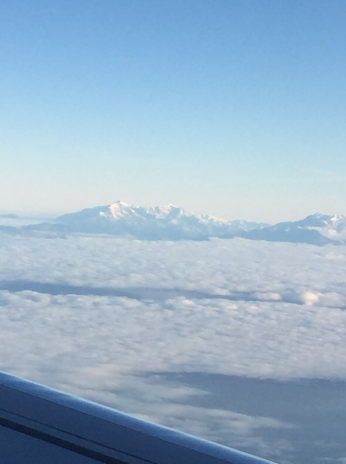 snow mountains plane